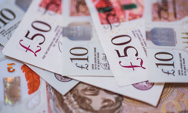 Bank notes in a pile