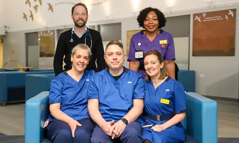 Arrhythmia nurse specialist Owen Rogers (seated centre) received emergency life-saving treatment from his colleagues at the Medway Maritime Hospital, Kent Picture: Medway NHS Foundation Trust 