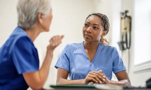 Reverse mentoring and diverse perspectives in nursing: two nurses have a one-to-one conversation