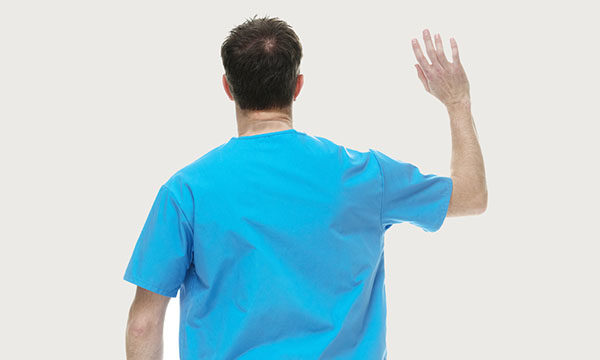 nurse waves goodbye