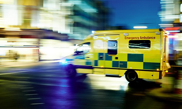 Ambulance speeding through street