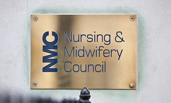 Brass nameplate on NMC building