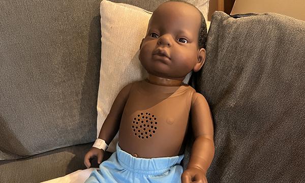 Developing empathy for parents through the use of infant simulation dolls