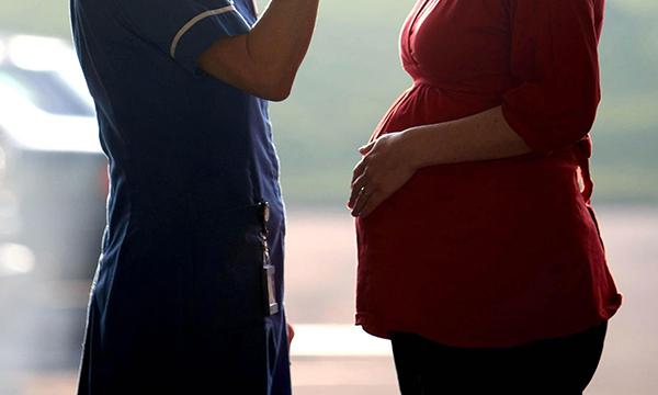 Midwife and pregnant woman