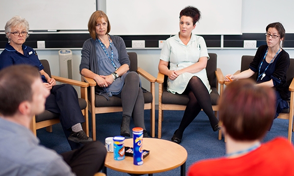 colleagues seated in a circle