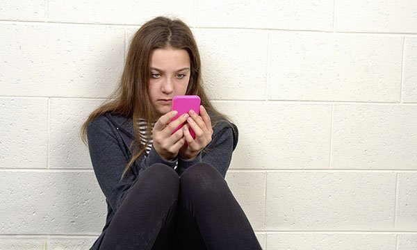 girl using smartphone